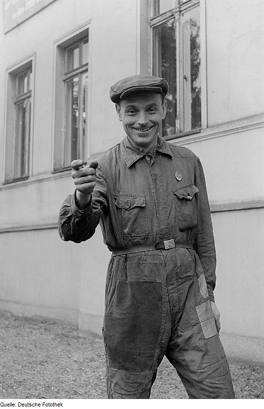 Vintage style workwear - Worker in overalls, Leipzig, 1952 Photo credit Roger and Renate Rössing Vintage style workwear - Worker in overalls, Leipzig, 1952 Photo credit Roger and Renate Rössing